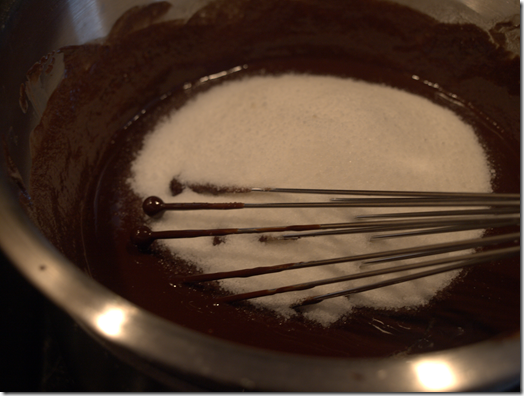 whisk together chocolate and sugar