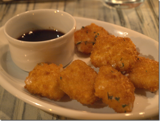 Crispy Fried Manchego cheese with spicy pomegranate honey sauce