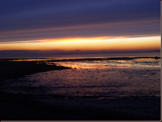 sun goes down on Galway Bay